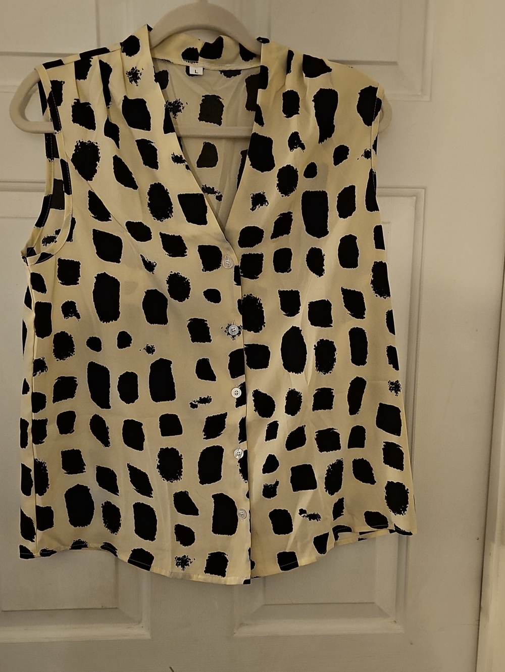 Sleeveless Button-Front Blouse in Cream with Black Spot Print
